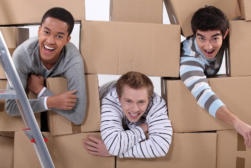 Business relocation team handling office furniture and equipment