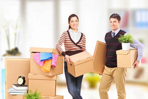 Packed boxes and furniture ready for apartment removals