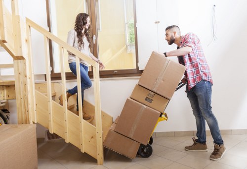 Local Barnet moving team handling boxes and household items